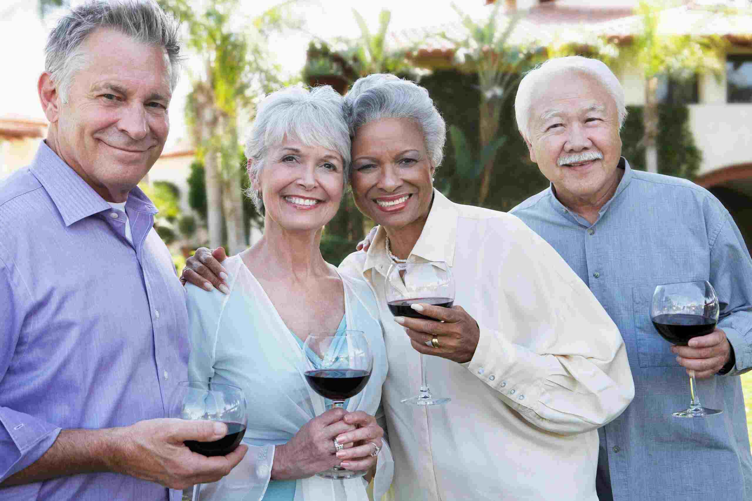 Group of seniors enjoying wine